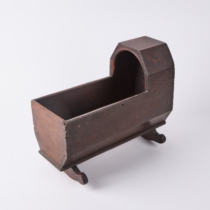 An Antique Wooden Dolls Cradle