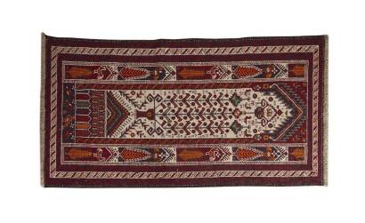 A Hand Knotted Baluchi Rug