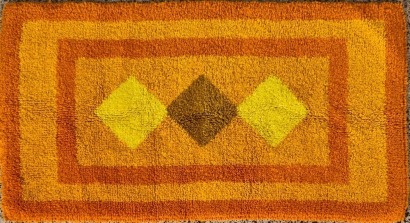 A Bright Looped Pile Mid-Century Rug