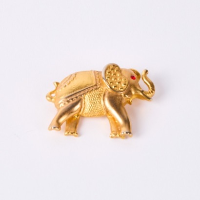 A Gold Elephant Trunk Up Brooch