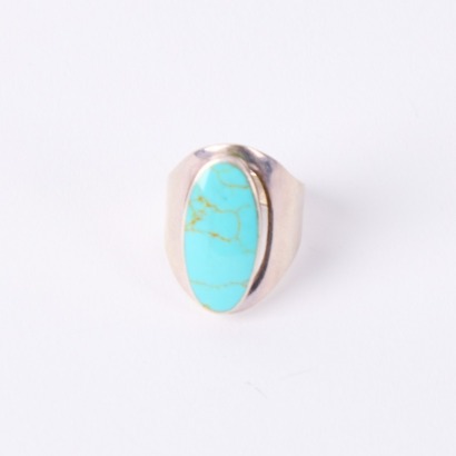 A Sterling Silver And Turquoise Wide Band Ring