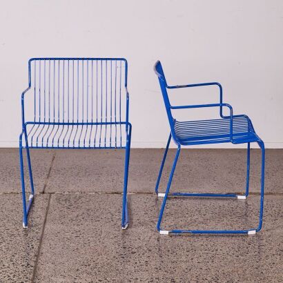 A Pair of Blue Wire Frame Chairs