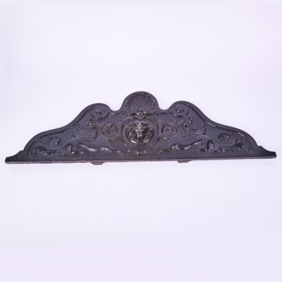 An Antique Cast Iron Fire Grate