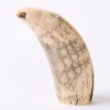 A Resin Replica Scrimshaw Whale's Tooth