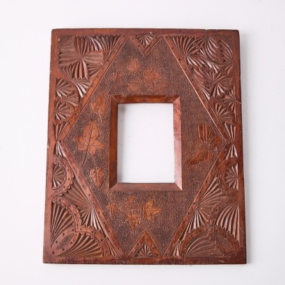 A Folk Art Frame with Designs of Leaves and Butterflies