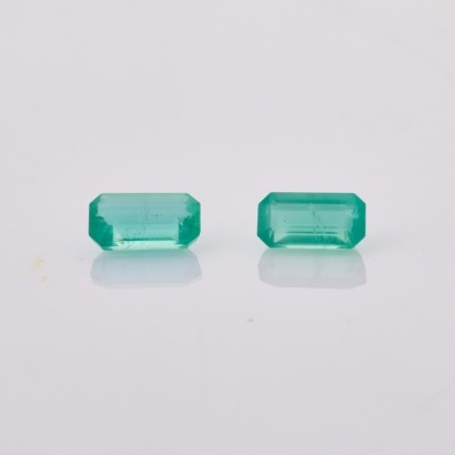 One Loose, Pair of .48ct Emerald Cut Emeralds