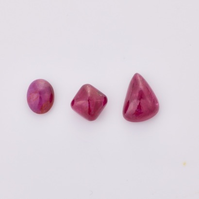 Parcel of Three Cabochon Cut Rubies, One Oval, One Square and one Pear Cut totalling 13.8cts