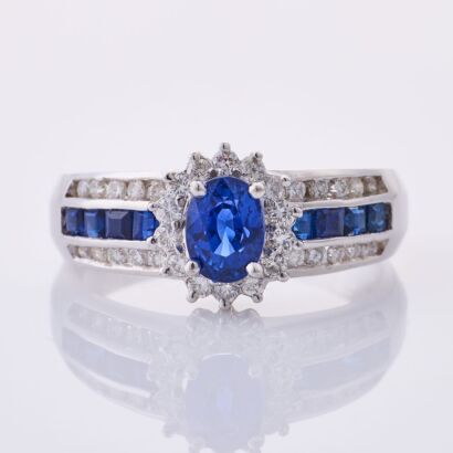 18ct White Gold, .78ct Blue Sapphire / .34ct Diamond Cluster Ring