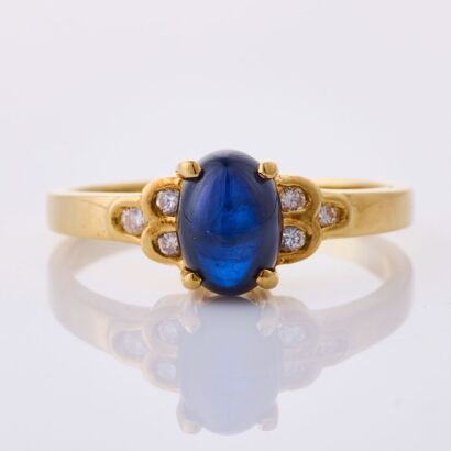 18ct Yellow Gold, Oval Cabochon Cut Sapphire / .05ct Diamond Ring