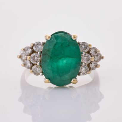 18ct White Gold, Oval 4.90ct Emerald / .66ct Diamond Ring