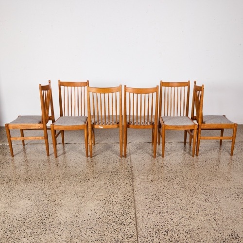 A Suite Of Six Refined Mid-Century Teak Dining Chairs