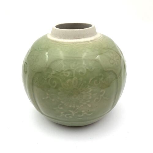 A Chinese Celadon Glazed Incised Jar