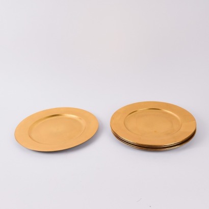 A Set of Six Gold Tone Charger Plates