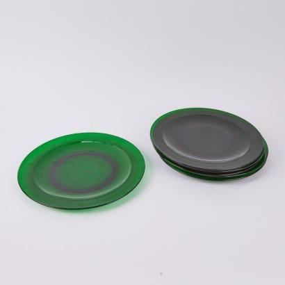 A Set of Six Green Glass Charger Plates