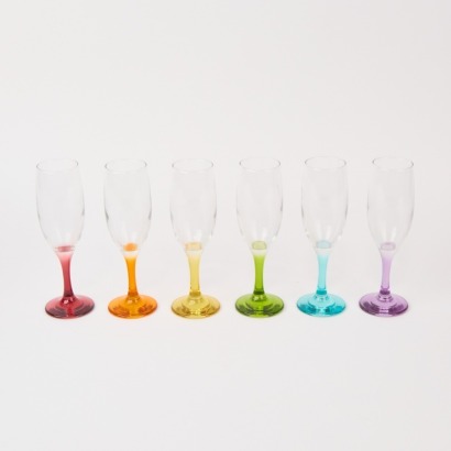 A Set of Six Multi-Coloured Champagne Glasses