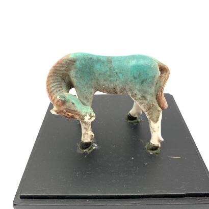 A Blue Glazed Pony Ornament