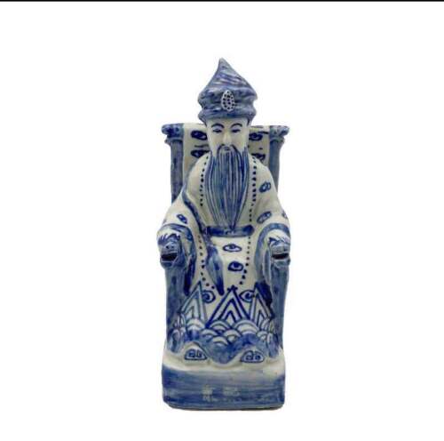 A Chinese Blue and White Sitting Statue