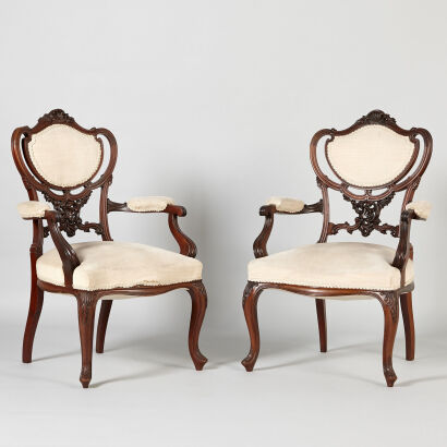 A Pair of Victorian Carved Armchairs