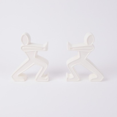 A Pair of Ceramic Figural Bookends