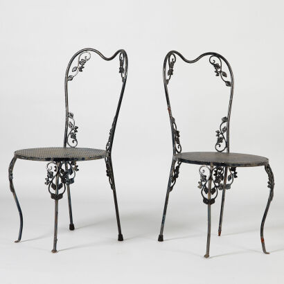 A Pair of Black Painted Outdoor Chairs