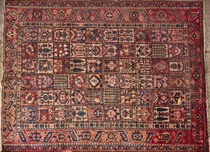 A Large Hand Knotted Persian Rug