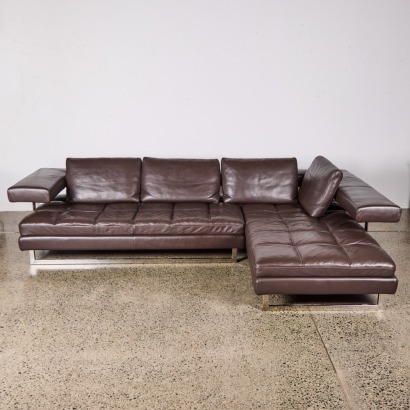 An Italian Sofa And Chaise In Chocolate Leather