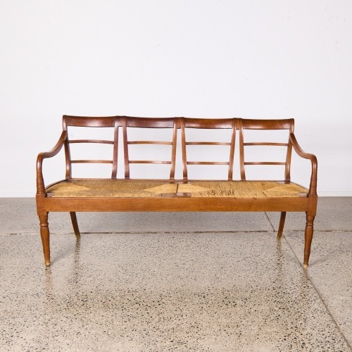 An Italian Carved Mahogany Ladder Back Rush Bench