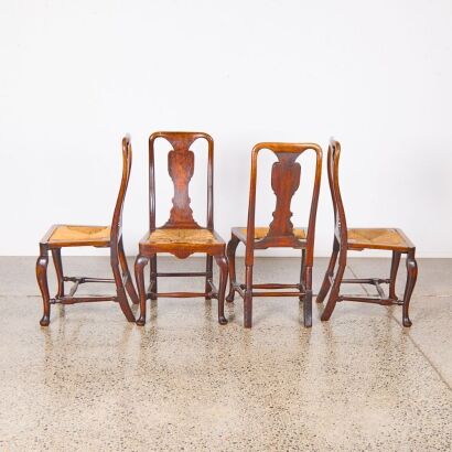 A Set of Antique Walnut Dining Chairs with Marquetry Panels