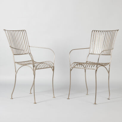 A Pair of French Metal Chairs 