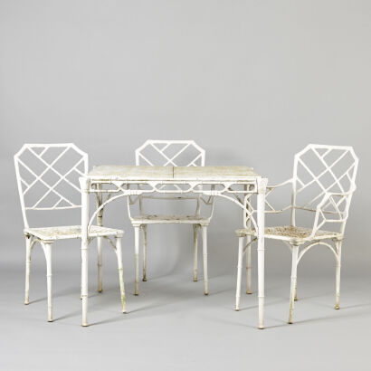 A Faux Bamboo Outdoor Table and Three Chairs