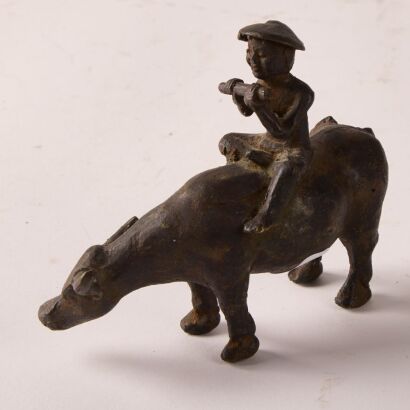 A Bronze Alloy Figure of a Man on a Bull, Japan