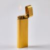 A Gold Plated Cartier, Les Must De Cartier Cigarette Lighter, circa 1983