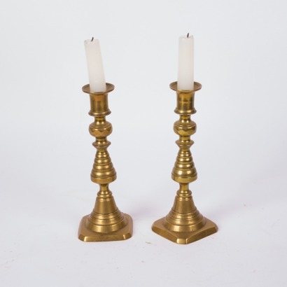A Pair of Brass Candlesticks Made in Britan