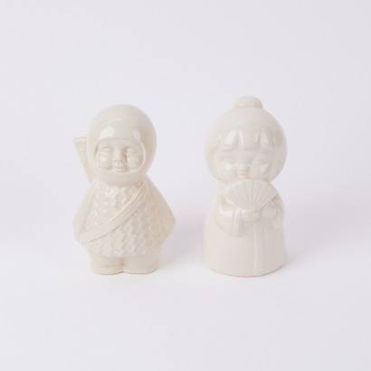 A Pair Of Benihana Pottery Figurines