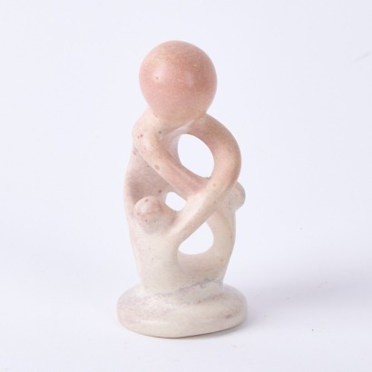 A Carved Stone Figural Statuette