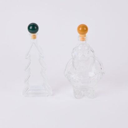 A Pair of Glass Christmas Bottles