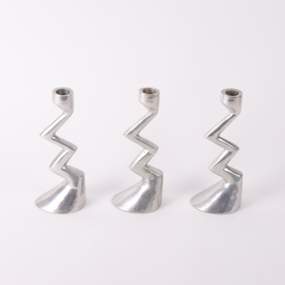 A Set Of Three Aluminum Zigzag Candlesticks