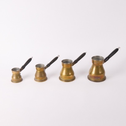 A Set Of Four Graduated Moroccan Coffee Pots