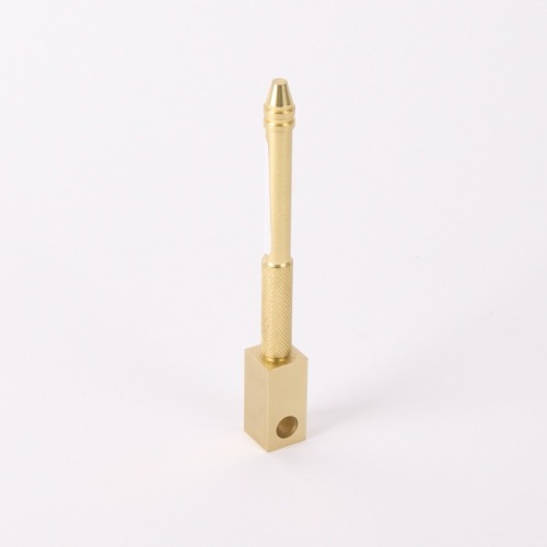 A Tom Dixon COG Brass Pen