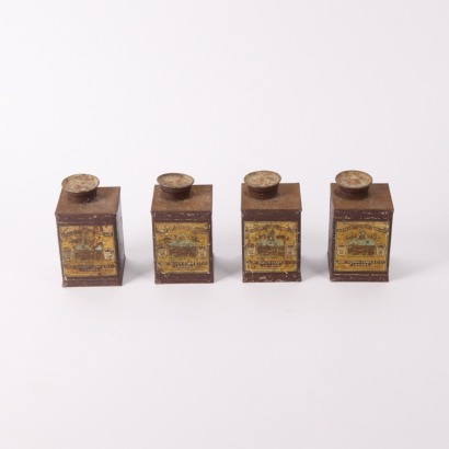 A Set of Four Varnish Bottles