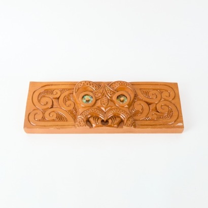 A Carved Rimu Tiki With Pawa Eyes