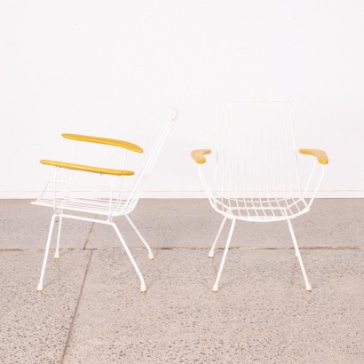A Pair of Retro Wire Frame Chairs With Wooden Arms
