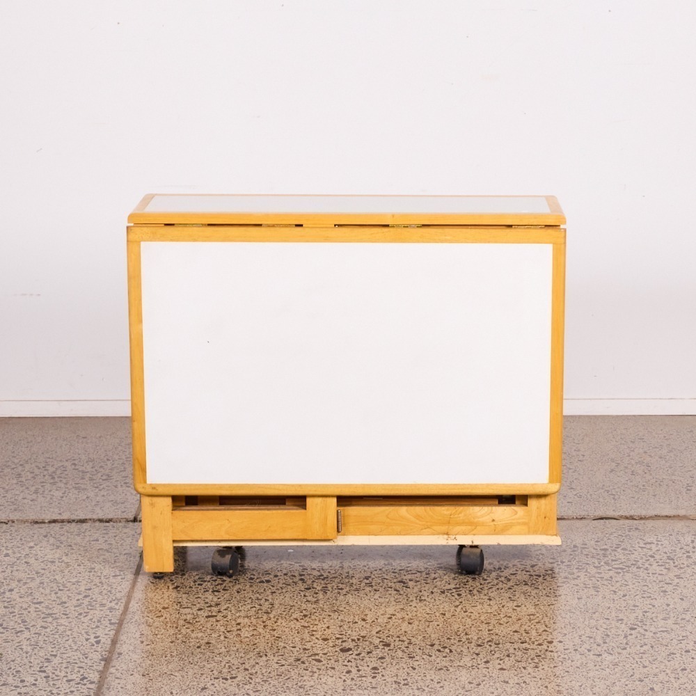 A Nordic Gateleg Table With 4 Chairs