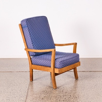 A Solid Oak Mid-Century Armchair