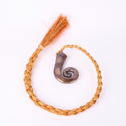 A Ceramic Koru Wall Hanging
