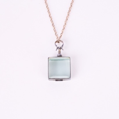 A Sterling Silver Glass Keepsake Locket