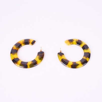 A Pair Of Large Plastic Tortoise Shell Hoop Earrings