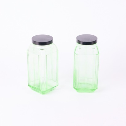 A Pair Of 1930s Green Depression Glass Jars With Lids