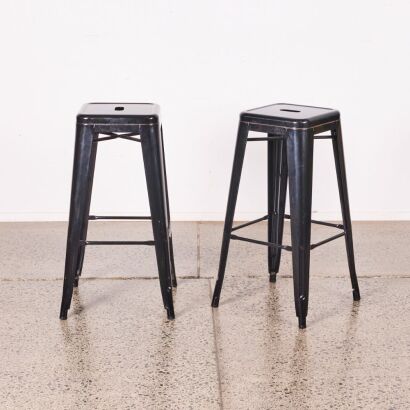 A Pair of Black Metal Barstools