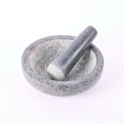 A Wide Granite Mortar And Pestle